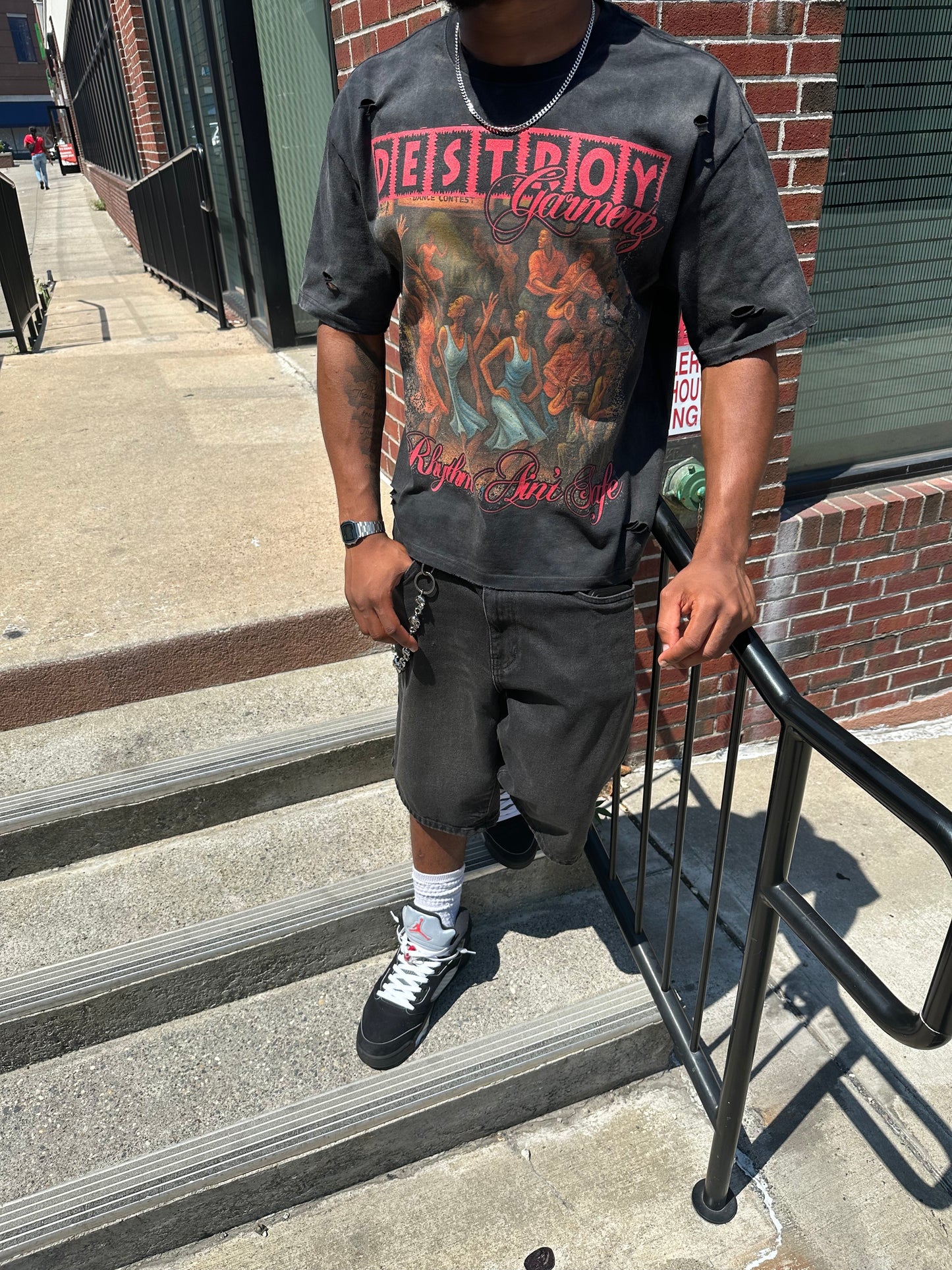 "RHYTHM AIN'T SAFE" TEE